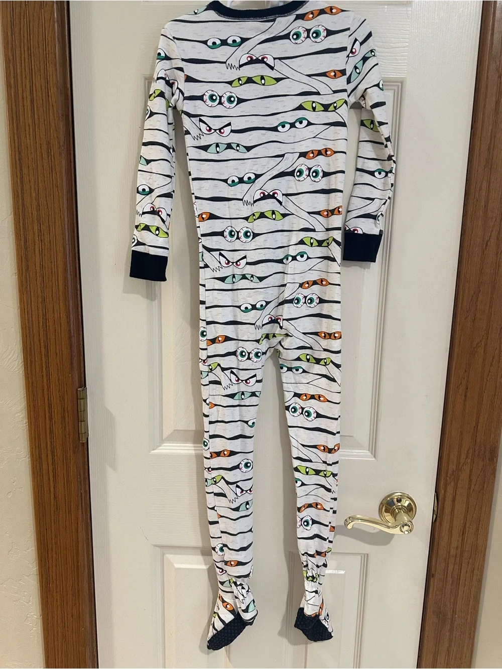 Old Navy White Striped Monster Eyes Footed One-Piece Pajamas with Navy Trim